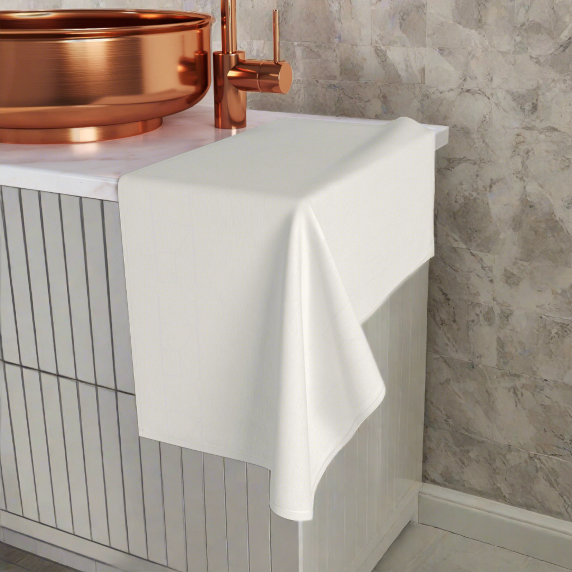 Bone White hand towel positioned over the square counter edge: