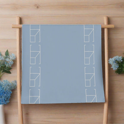 Blue Mist hand towel hanging from a wooden ladder
