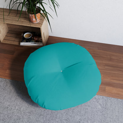 Round tufted floor pillow from the Verdigris Collection